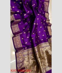 purple colour banarasi sarees with All over Buttas design