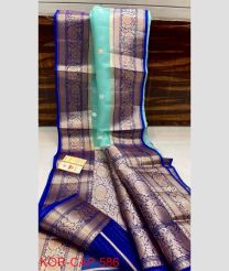 blue colour banarasi sarees with All over Buttas design