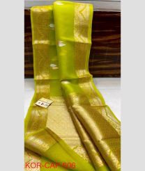 green colour banarasi sarees with All over Buttas design