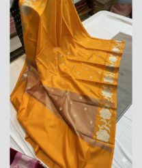 mustard yellow colour banarasi sarees with All over Buttas design