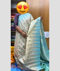 Cream and Sky Blue gadwal pattu sarees with temple Kuttu border design