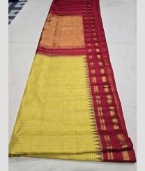 Yellow and Maroon gadwal pattu sarees with All over Checks design