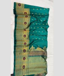 Medium Teal and Golden gadwal pattu sarees with turning border design