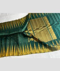 Dark Teal and Golden gadwal pattu sarees with Temple Border design