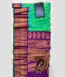 Turquoise and Purple gadwal pattu sarees with All over Checks and Buttas design