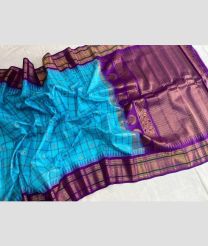 Blue Turquoise and Magenta gadwal pattu sarees with All over Checks and Buttas design