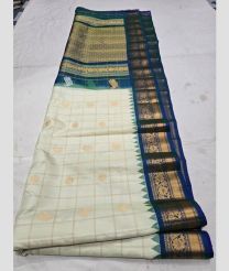 Half White and Teal gadwal pattu sarees with All over Buttas design