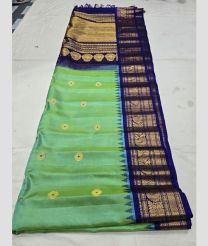 Lite Green and Navy Blue gadwal pattu sarees with All over Buttas design