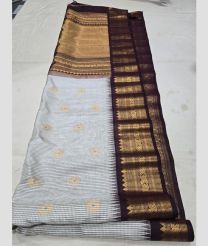 Lite Cream and Chocolate gadwal pattu sarees with All over Buttas design