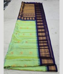 pista and Navy Blue gadwal pattu sarees with All over Buttas design