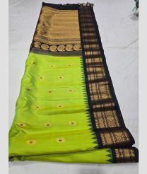 Parrot Green and Black gadwal pattu sarees with All over Buttas design