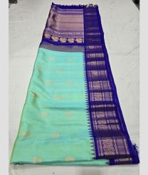 Turquoise and Royal Blue gadwal pattu sarees with All over Buttas design