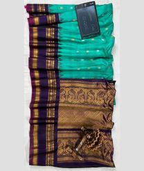 Turquoise and Black gadwal pattu sarees with All over Checks and Buttas design