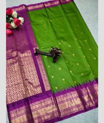green and purple colour gadwal pattu sarees with All over Buttas design