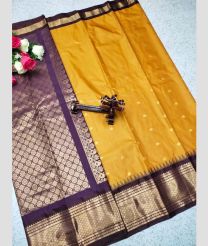 mustard and silver colour gadwal pattu sarees with All over Buttas design