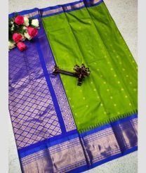 silver and green colour gadwal pattu sarees with All over Buttas design
