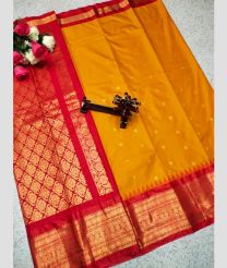 orange and brown colour gadwal pattu sarees with All over Buttas design