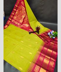 olive green colour gadwal pattu sarees with Kanchi Border design