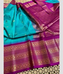 cyan blue colour gadwal pattu sarees with Temple Border design