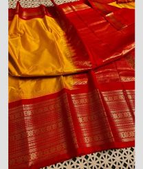 maroon and orange colour gadwal pattu sarees with Temple Border design