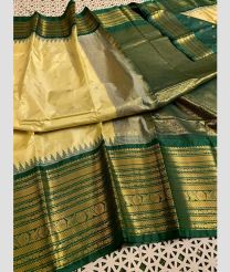 cream and brown colour gadwal pattu sarees with Temple Border design