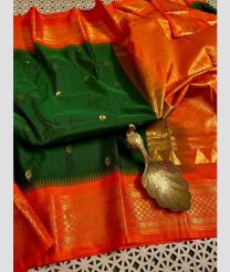 green and coral colour gadwal pattu sarees with Temple Border design