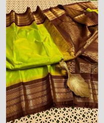 olive and brown colour gadwal pattu sarees with Temple Border design