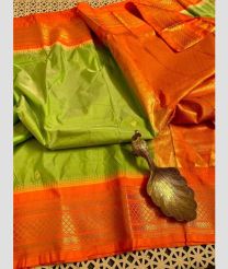 olive and coral colour gadwal pattu sarees with Temple Border design