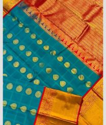 blue and brown colour gadwal pattu sarees with Kanchi Border design