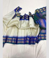 gray and blue colour gadwal pattu sarees with temple Kuttu border design