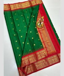 green and brown colour gadwal pattu sarees with All over Buttas design
