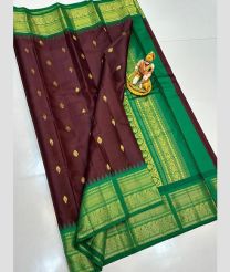 charcoal and green colour gadwal pattu sarees with All over Buttas design