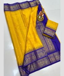 yellow colour gadwal pattu sarees with All over Buttas design
