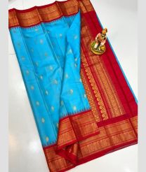 blue and brown colour gadwal pattu sarees with All over Buttas design