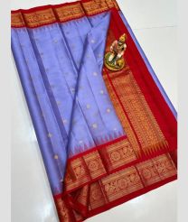 light blue colour gadwal pattu sarees with All over Buttas design