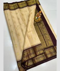 brown colour gadwal pattu sarees with All over Buttas design