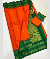 orange and green colour gadwal pattu sarees with All over Buttas design