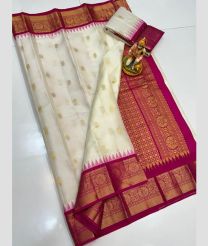 gray colour gadwal pattu sarees with All over Buttas design