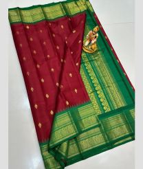 magenta colour gadwal pattu sarees with All over Buttas design