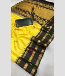 yellow colour gadwal pattu sarees with All over Buttas design