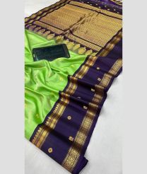 green colour gadwal pattu sarees with All over Buttas design