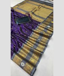 violet colour gadwal pattu sarees with All over Buttas design