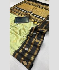 gray and brown colour gadwal pattu sarees with All over Buttas design