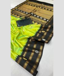 green and brown colour gadwal pattu sarees with All over Buttas design
