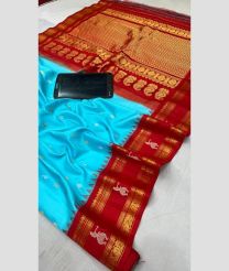 blue and brown colour gadwal pattu sarees with All over Buttas design