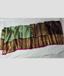 green colour gadwal pattu sarees with Jari Border design