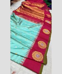 blue colour gadwal pattu sarees with All over Buttas design
