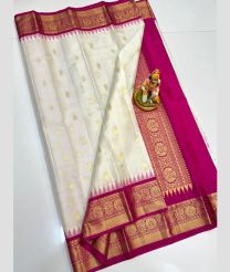cream colour gadwal pattu sarees with All over Buttas design