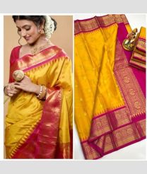 orange colour gadwal pattu sarees with All over Buttas design