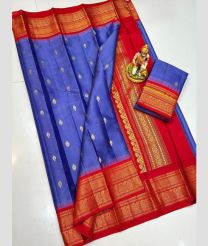 blue colour gadwal pattu sarees with All over Buttas design